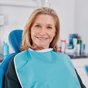 a woman during her dental implant consultation
